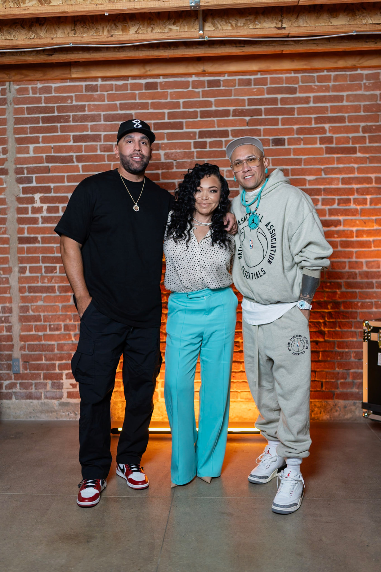 Brian with a guest and crew member at the studio